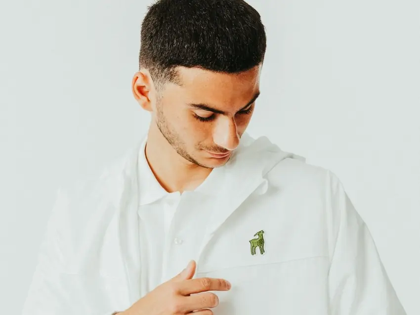 lacoste muda logo