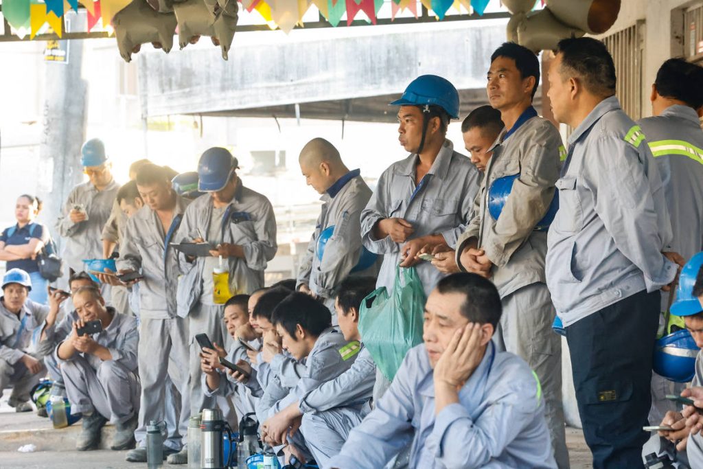 trabalhadores chineses